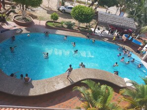 Outdoor pool, pool umbrellas, pool loungers