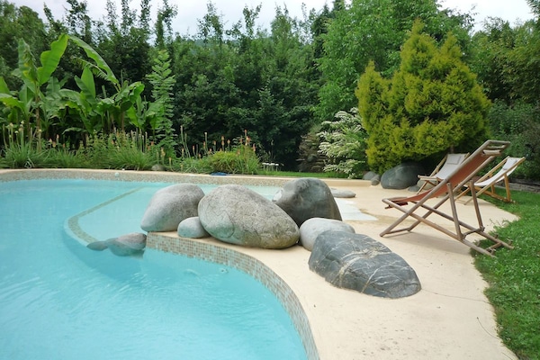 Seasonal outdoor pool, pool umbrellas, pool loungers