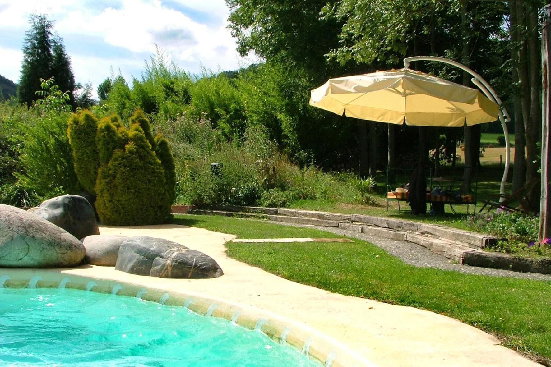 Seasonal outdoor pool, pool umbrellas, pool loungers
