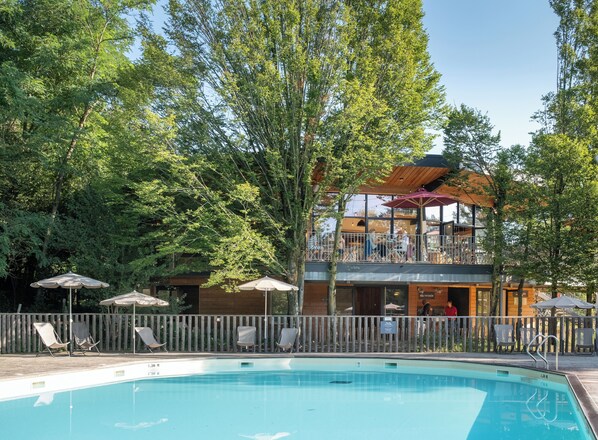 Seasonal outdoor pool, pool umbrellas, pool loungers