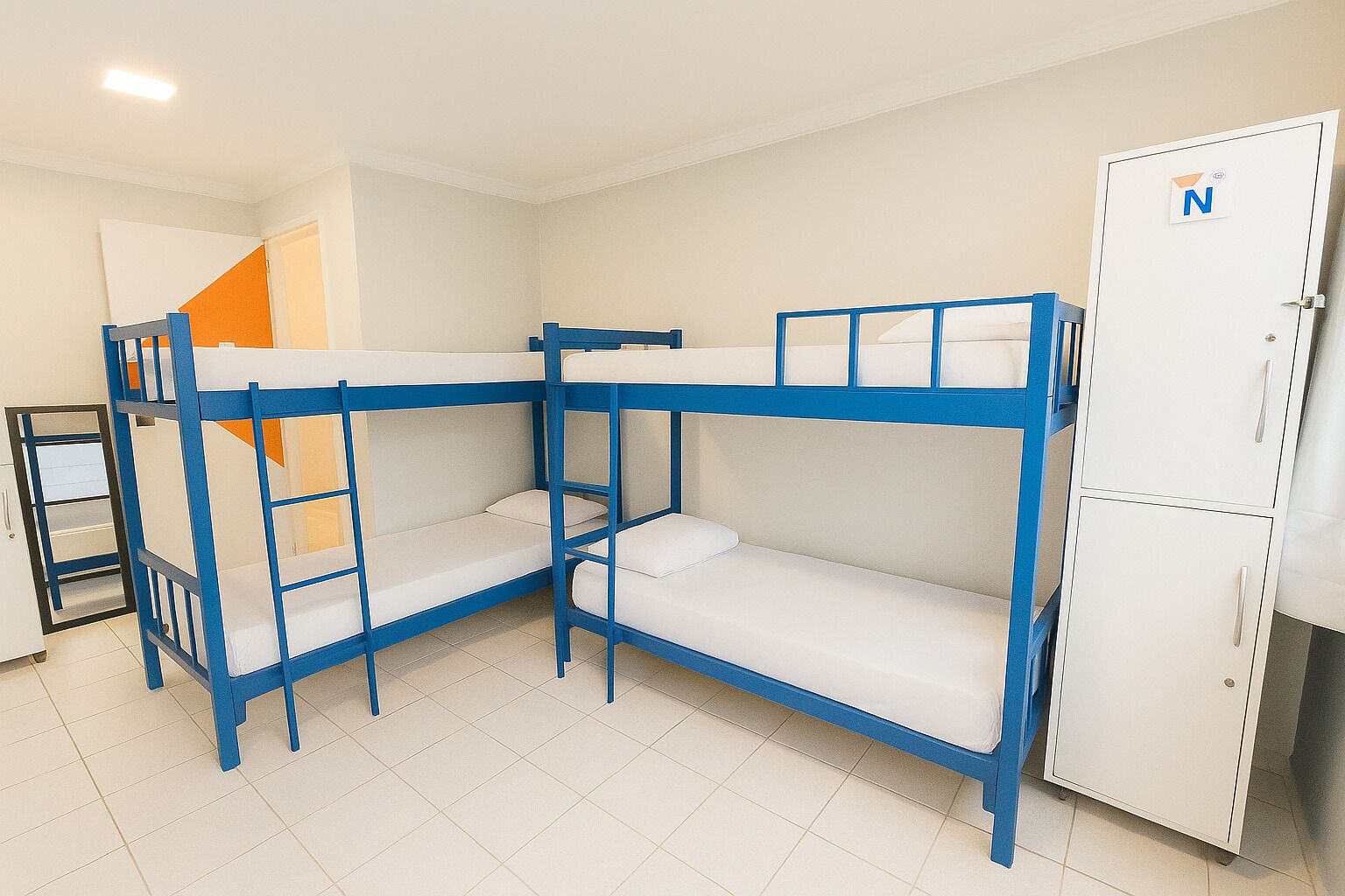 A bunk bed room with a white wardrobe and a door with a 'N' sign.