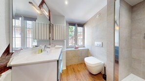 Shower, hair dryer, towels