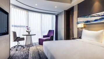 Room | Premium bedding, down comforters, blackout drapes, rollaway beds