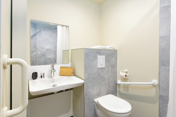 Shower, deep soaking tub, hair dryer, towels