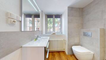 Bathtub, hair dryer, towels