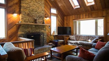 Flat-screen TV, fireplace, video games, DVD player