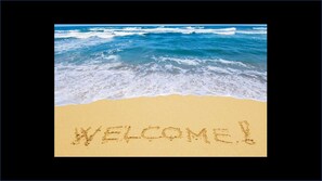On the beach, sun loungers, beach towels