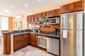 Fridge, microwave, stovetop, coffee/tea maker