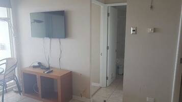 Apartment, 2 Bedrooms | Living area | Flat-screen TV