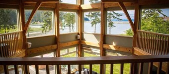 Luxury Lodge Style Custom Home on Private Oceanfront Lagoon Acreage. 