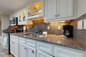 Fridge, microwave, coffee/tea maker, toaster