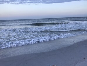 A beach with waves gently lapping onto the shore. - Sweet! Indian Rocks Beach Rental, 1/2 Duplex, B, Renovated, Short walk to Beach (Indian Rocks Beach)