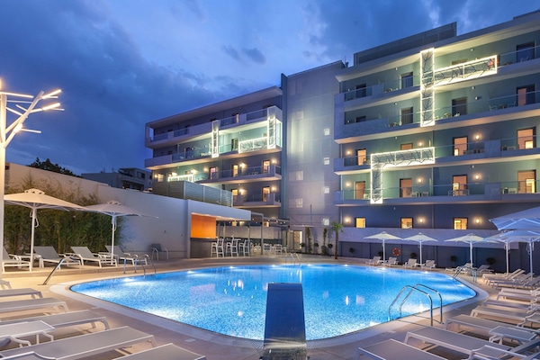Indoor pool, outdoor pool, pool umbrellas, sun loungers