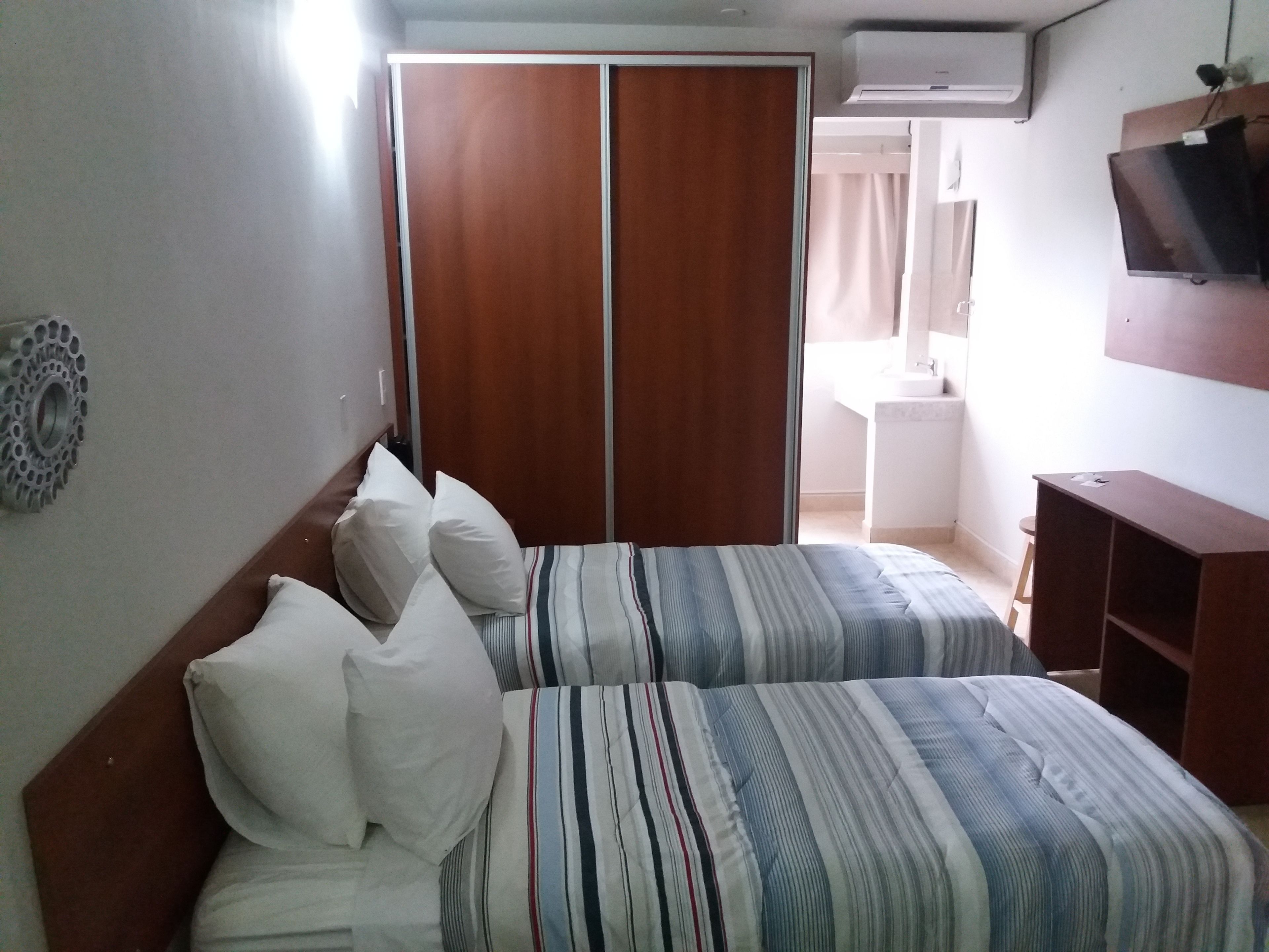 standard twin room, 2 single beds | minibar, in-room safe, desk, soundproofing