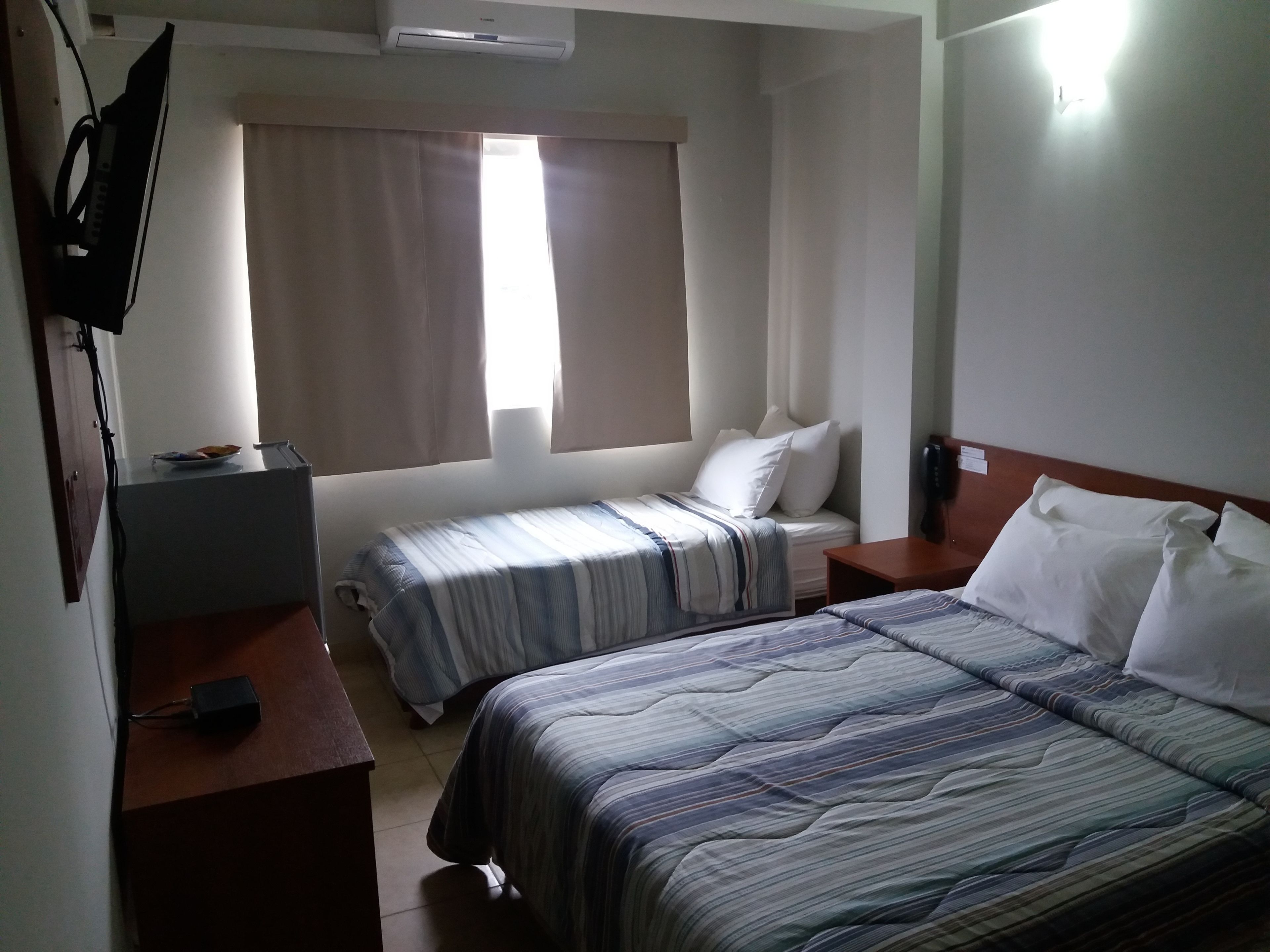 standard triple room, 3 single beds | minibar, in-room safe, desk, soundproofing