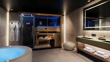 Shower, rainfall showerhead, designer toiletries, hair dryer