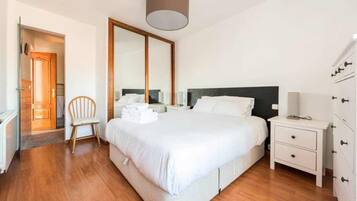 Apartment, 2 Bedrooms, City View | 2 bedrooms, down comforters, blackout drapes, iron/ironing board