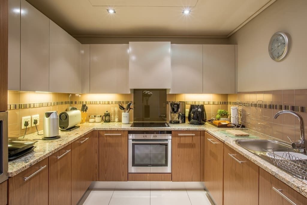 luxury suite, 2 bedrooms, kitchen, ocean view | private kitchen | full-sized fridge, microwave, oven, stovetop