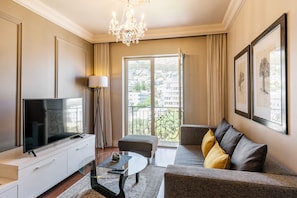 Luxury Suite, 1 Bedroom, Kitchen, Mountain View | Living area | 55-inch LED TV with satellite channels, TV, Netflix