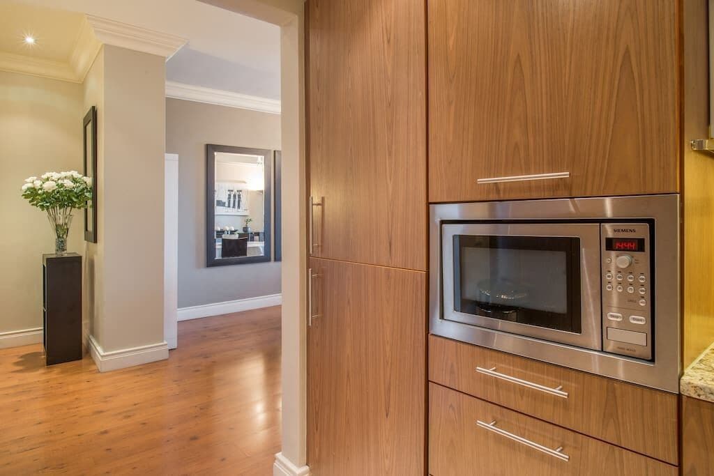 luxury suite, 2 bedrooms, kitchen, ocean view | private kitchen | full-sized fridge, microwave, oven, stovetop