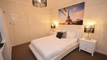 4 bedrooms, desk, iron/ironing board, travel cot