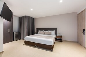 Deluxe kamer | Een bureau, een strijkplank/strijkijzer, gratis wifi, beddengoed