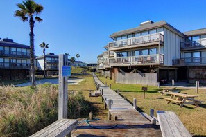 Exterior - Great views, swimming pool, boardwalk to the beach, picnic tables, play area, co (Port Aransas)