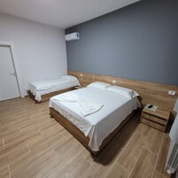 Quarto triplo família | Quartos à prova de som