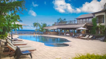 Outdoor pool, pool umbrellas, sun loungers