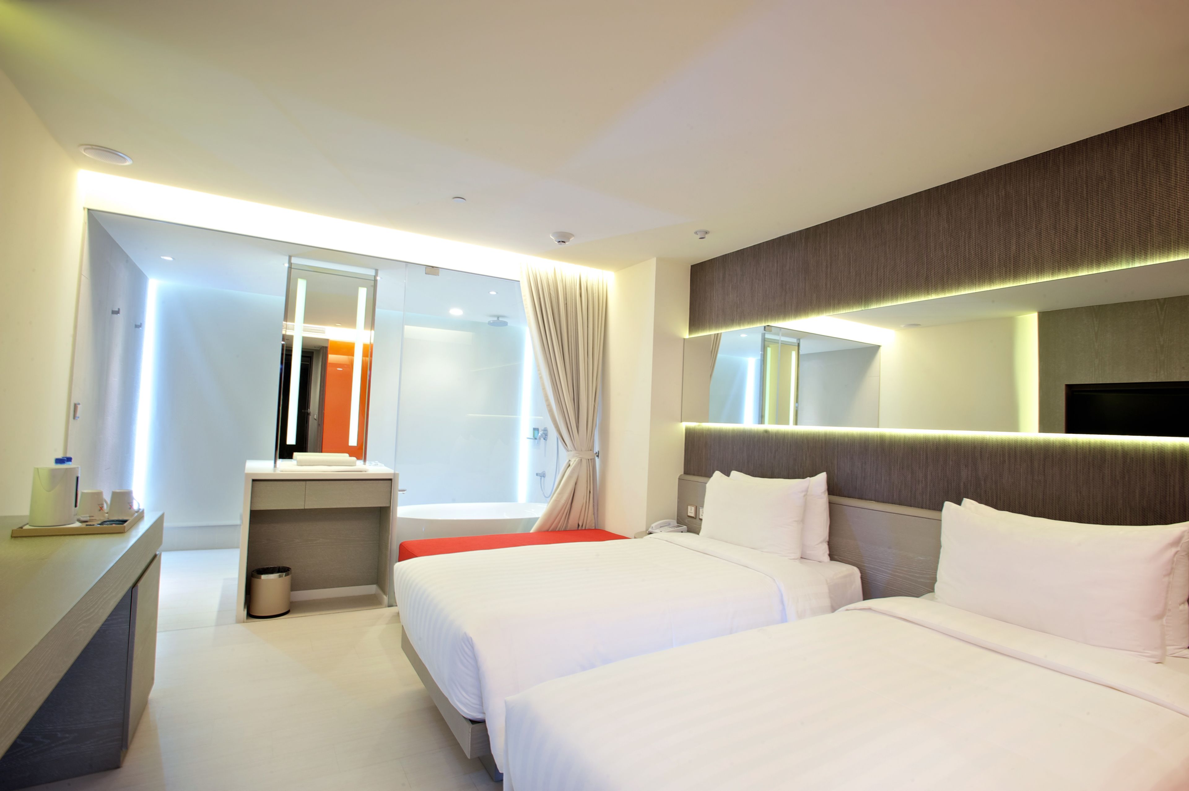 deluxe twin room | premium bedding, in-room safe, individually decorated, desk