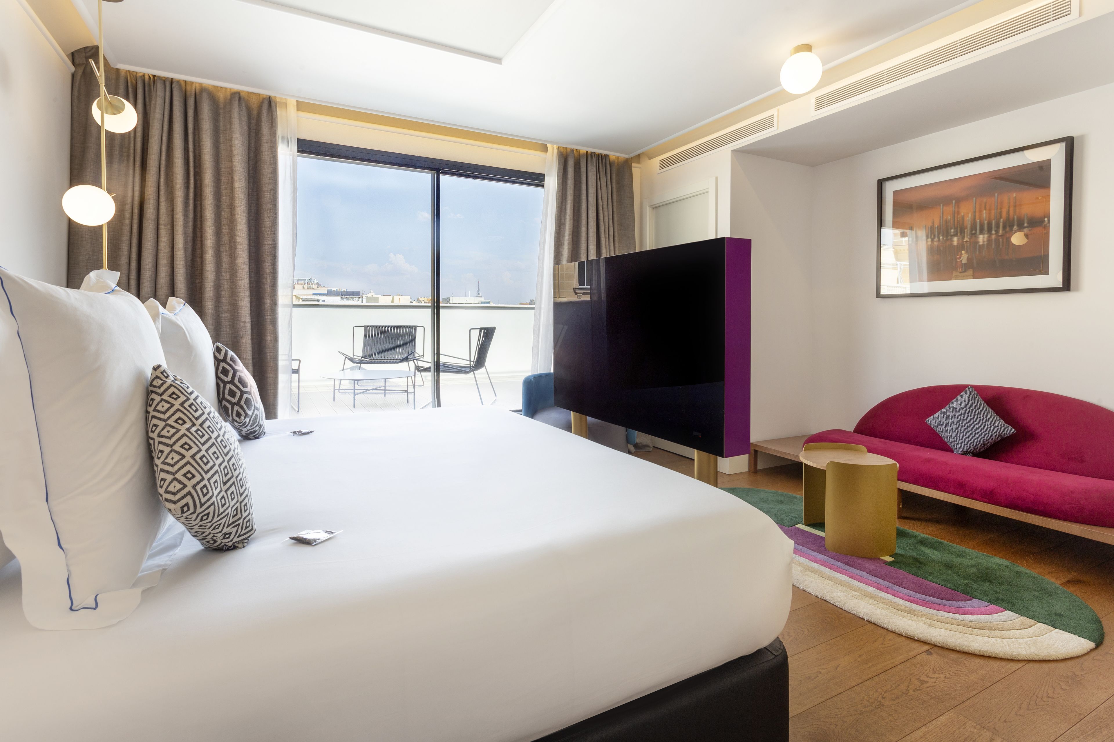 deluxe room, terrace | minibar, in-room safe, desk, blackout curtains