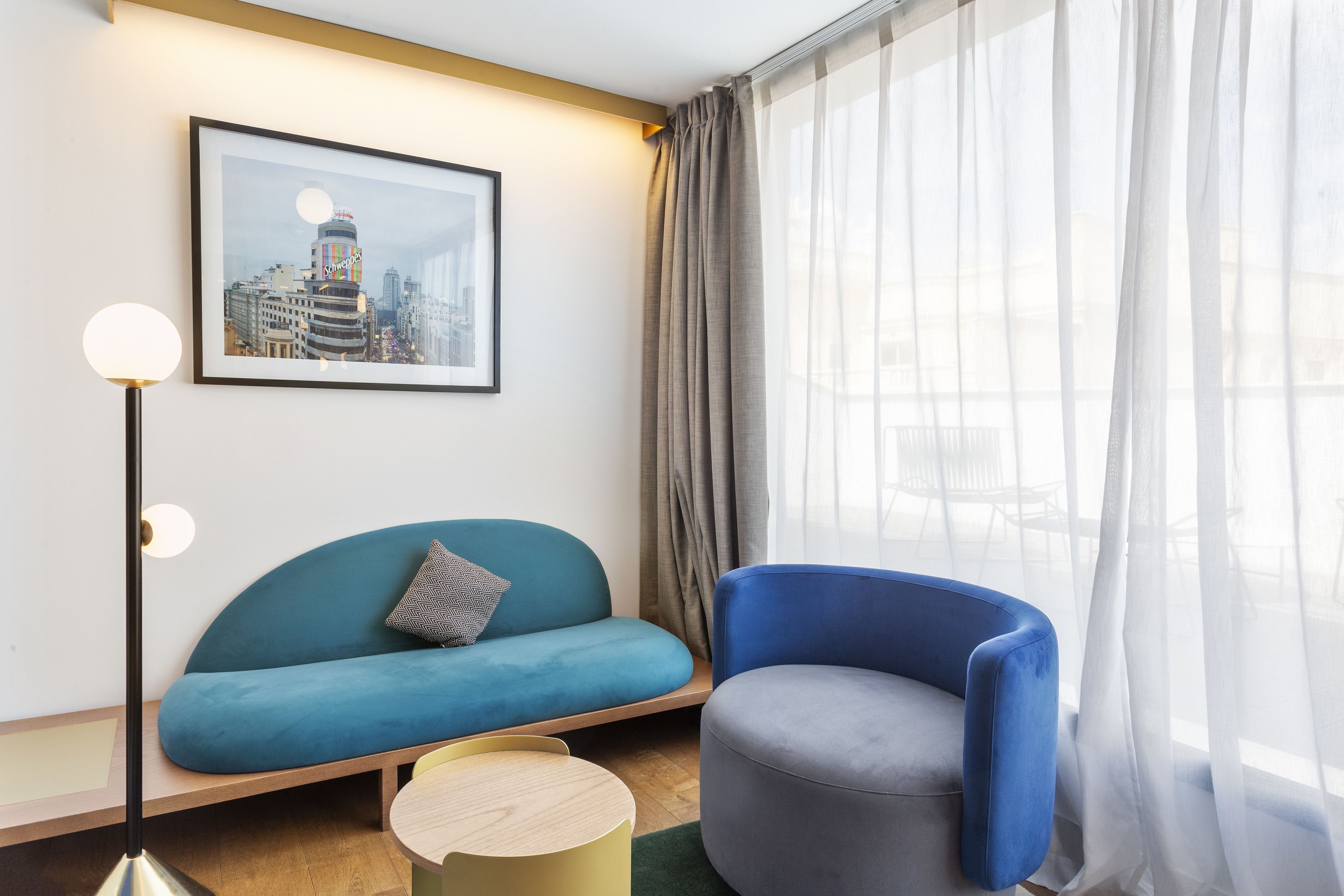 deluxe room, terrace | living room | flat-screen tv