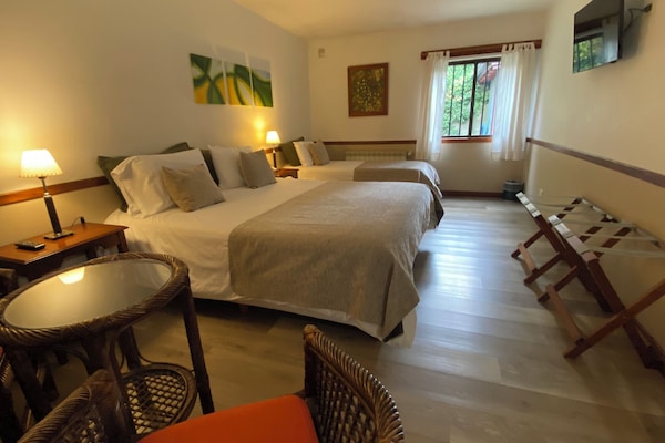 Luxe beddengoed, donsdekens, pillowtop-bedden, een kluis op de kamer