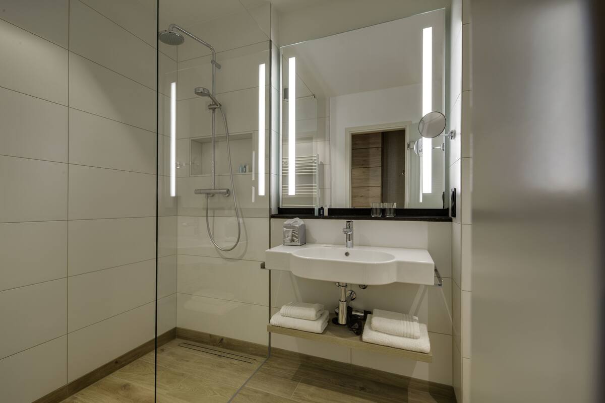 shower, free toiletries, hair dryer, bathrobes