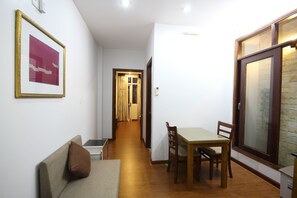 Appartement, 1 chambre | Coin séjour | Télévision à écran plat