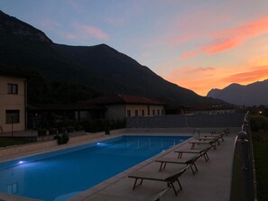 Seasonal outdoor pool, pool loungers