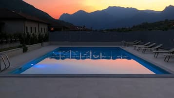 Seasonal outdoor pool, sun loungers