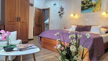 Premium bedding, memory-foam beds, minibar, in-room safe