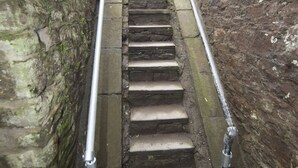 A set of stone steps with metal handrails, leading up a flight of stairs. - The Priory Cellars Abbots Leigh (Bristol)