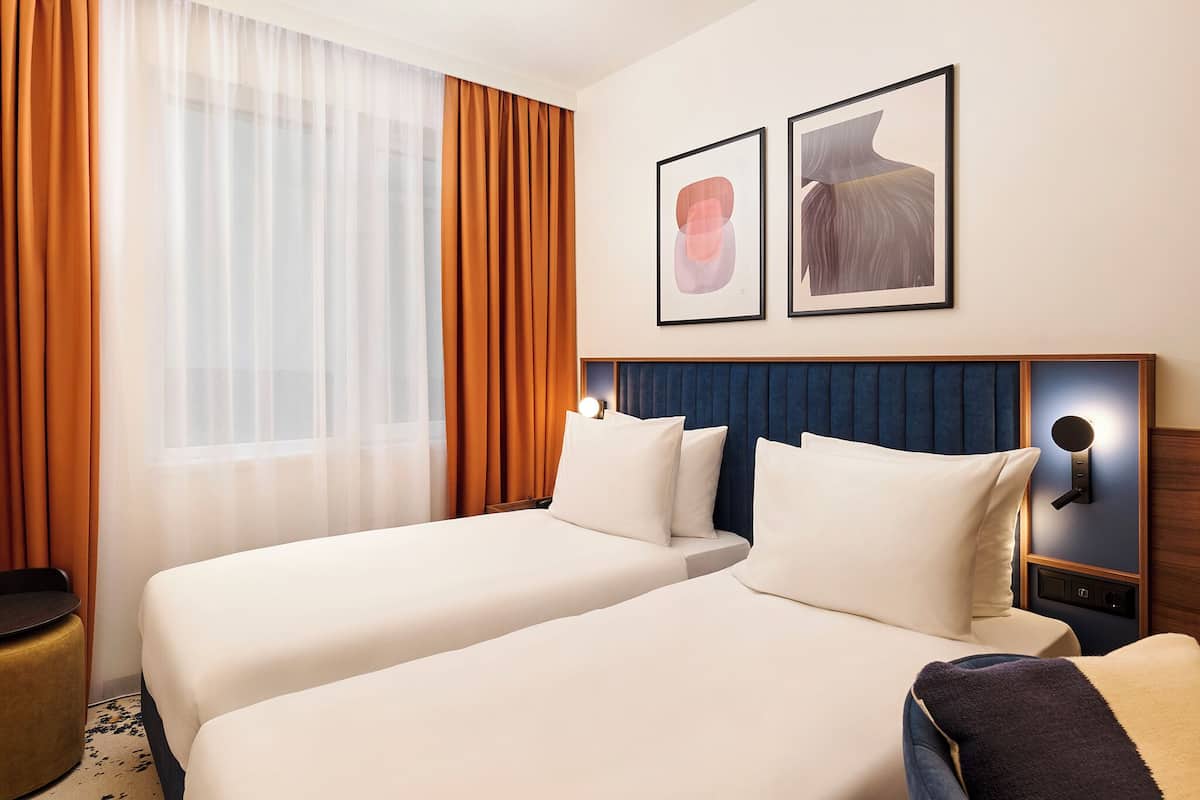 Standard Twin Room, 2 Single Beds | In-room safe, desk, laptop workspace, blackout curtains