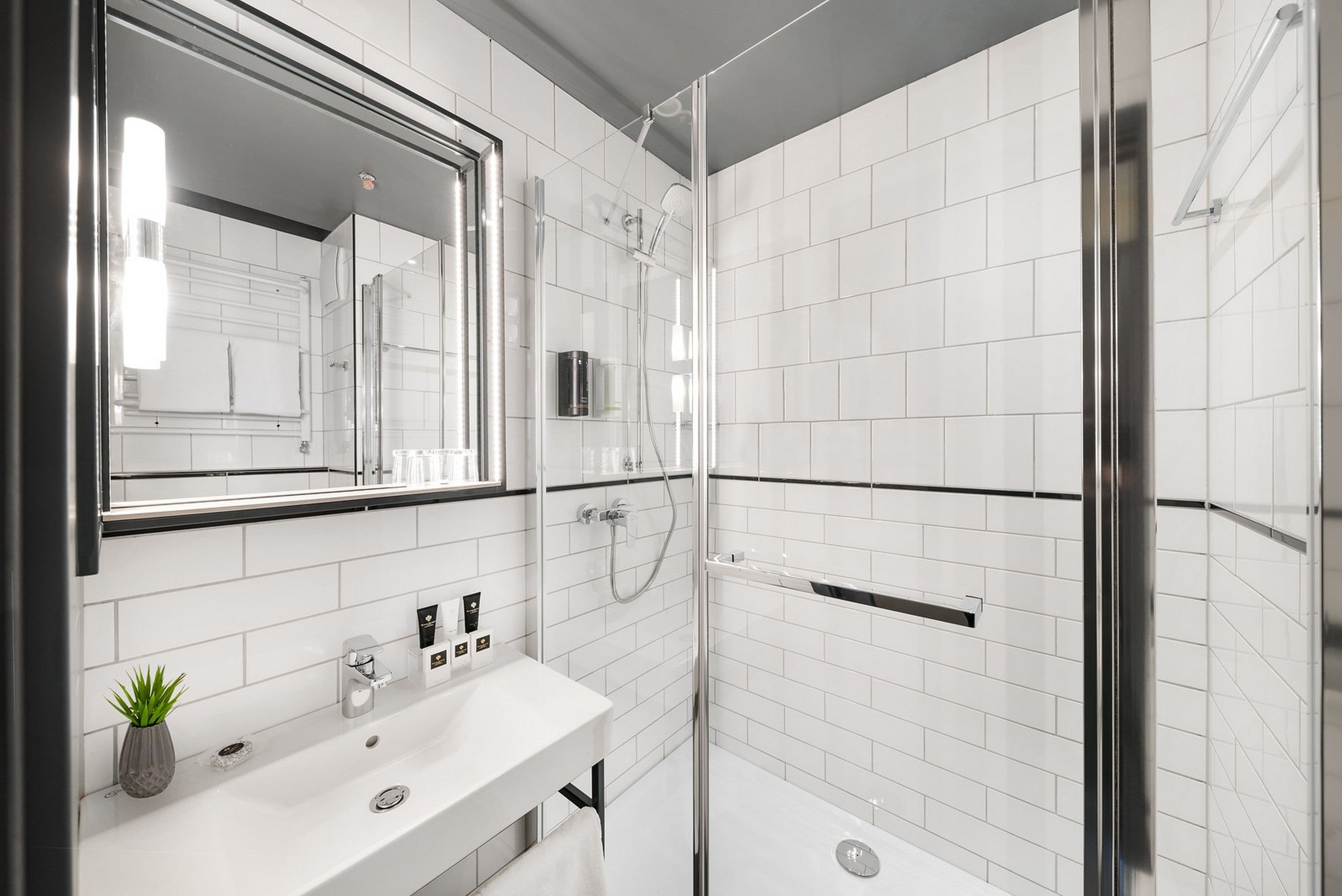 family room | bathroom | shower, free toiletries, hair dryer, towels