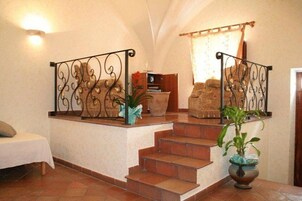 Family Quadruple Room | Minibar, in-room safe, desk, cribs/infant beds