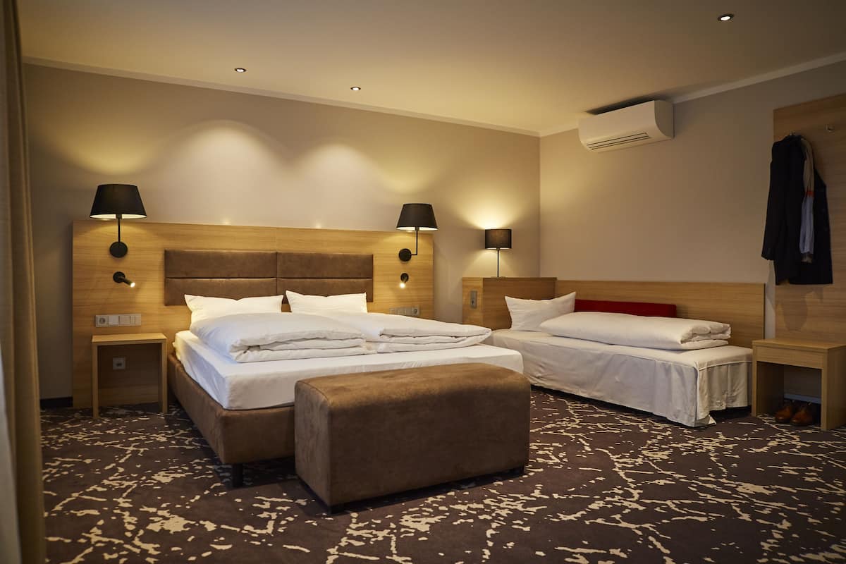 Deluxe Triple Room | In-room safe, desk, blackout drapes, soundproofing