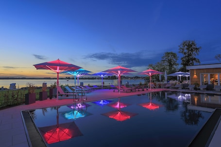 Outdoor pool, a heated pool, pool umbrellas, sun loungers