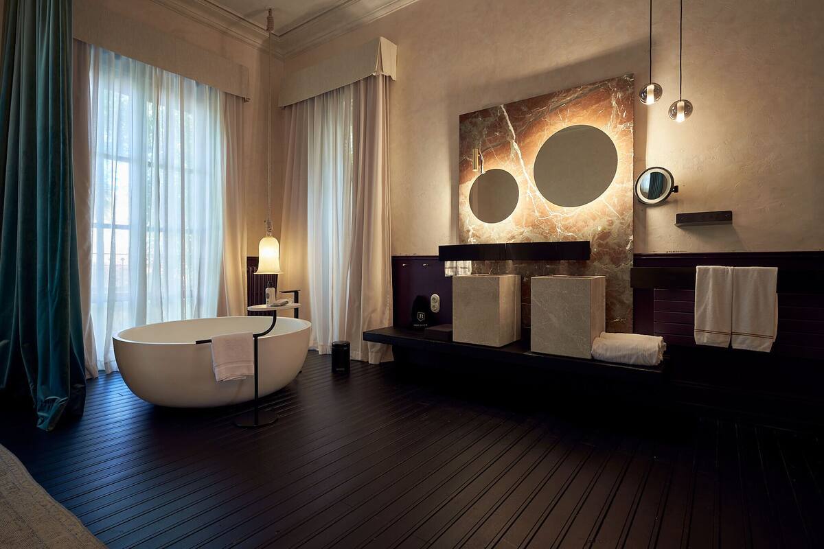 premium suite | bathroom | free toiletries, hair dryer, bathrobes, slippers