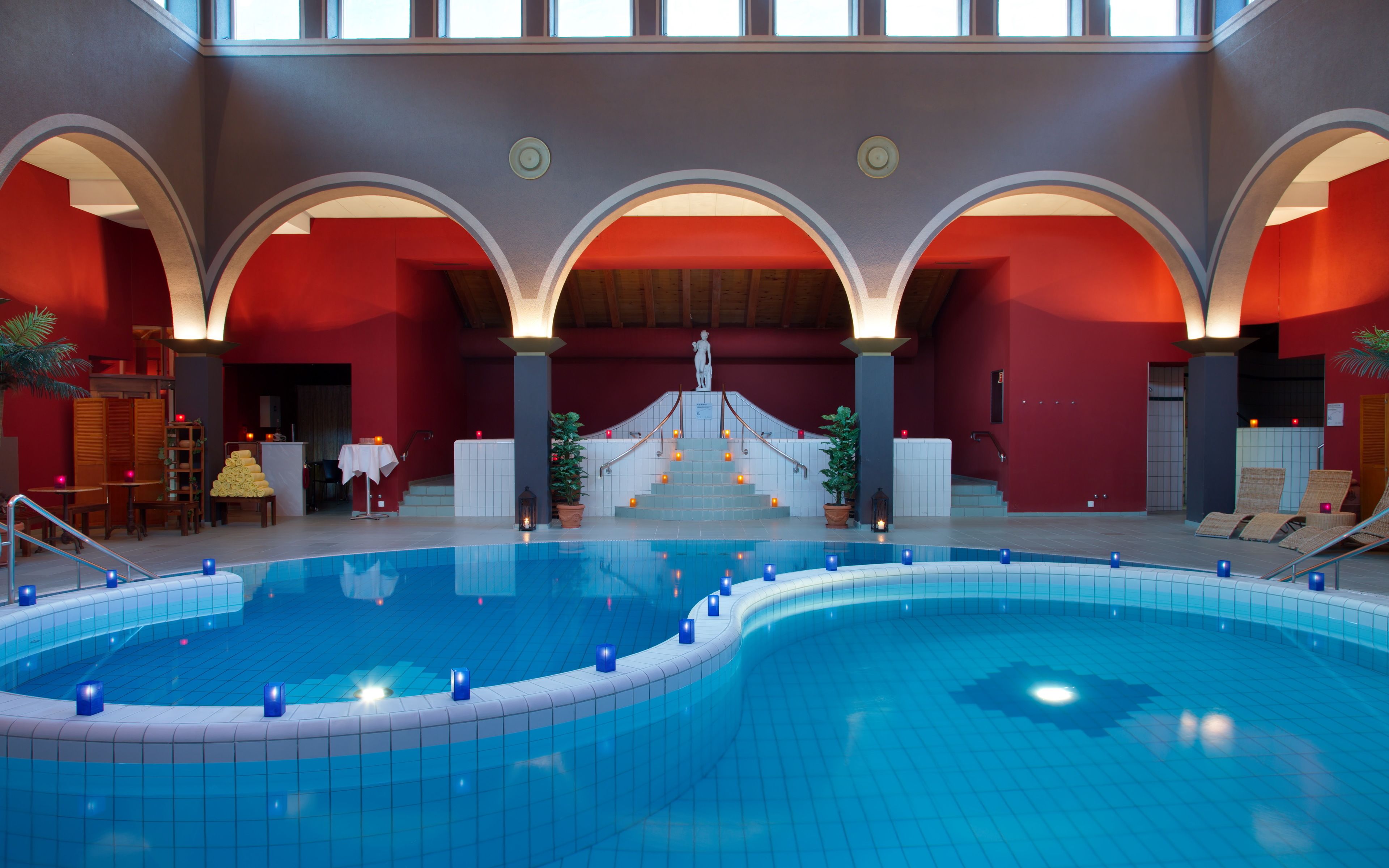 2 indoor pools, 2 outdoor pools, open 9:00 AM to 8:00 PM, pool umbrellas