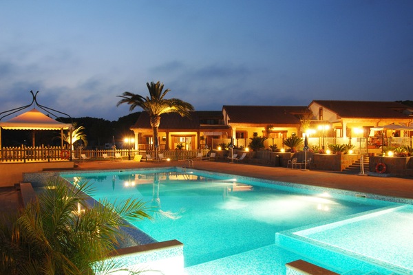 Seasonal outdoor pool, open 9:00 AM to 7:00 PM, pool umbrellas