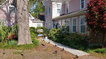 Stroll down this charming residential street lined with unique two-story houses.