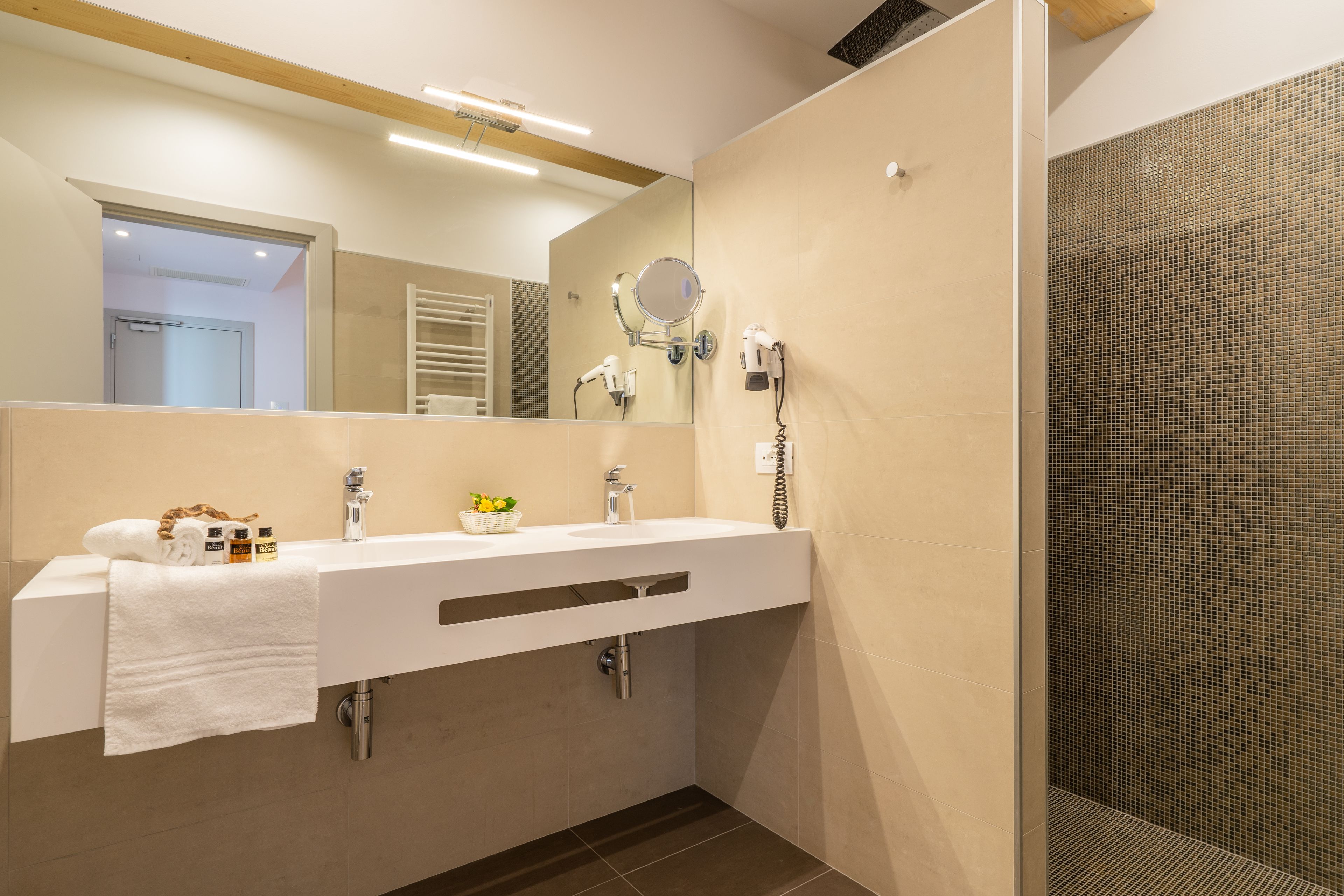 free toiletries, hair dryer, slippers, bidet