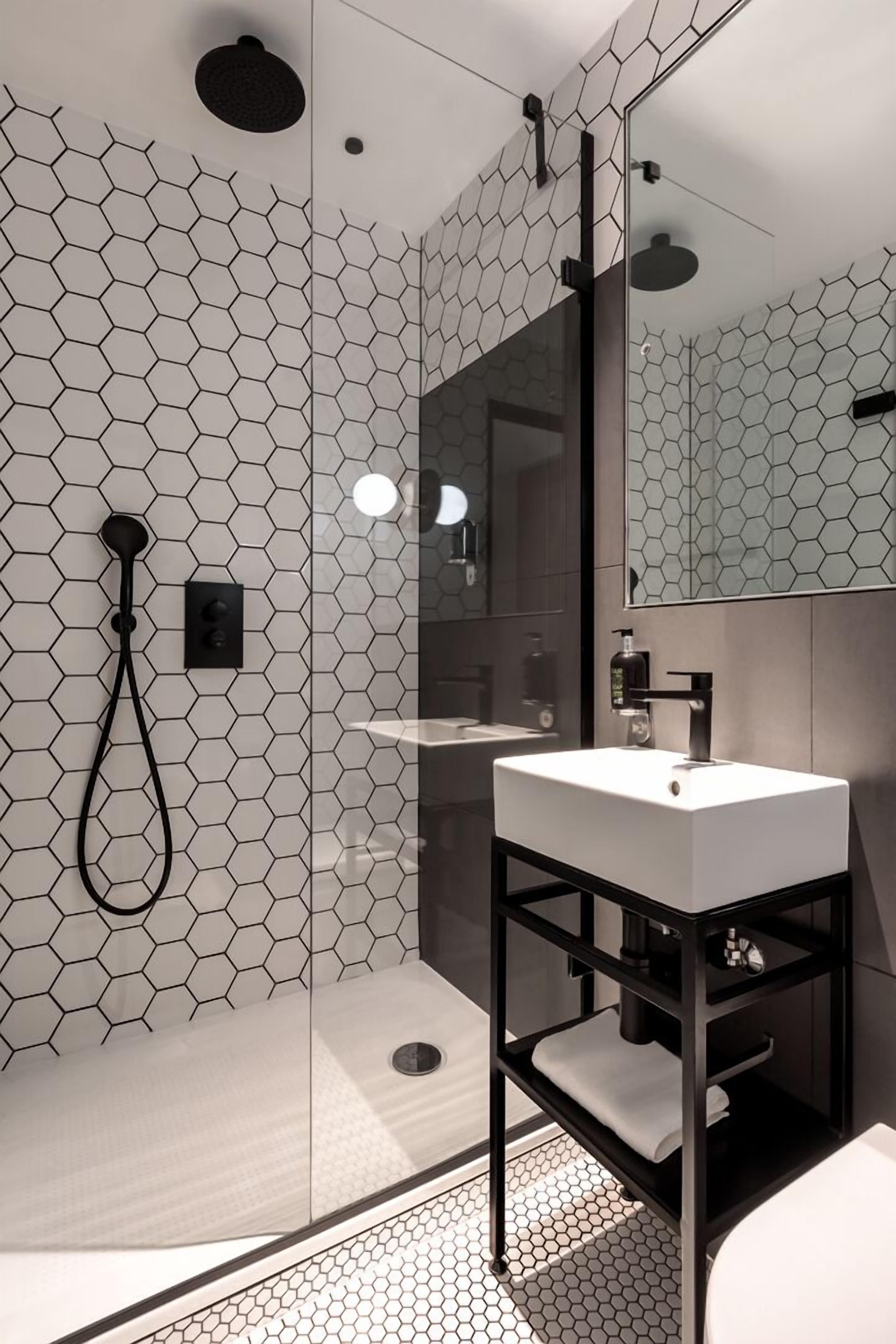 cozy comfort with a little extra space | bathroom | shower, free toiletries, hair dryer, towels